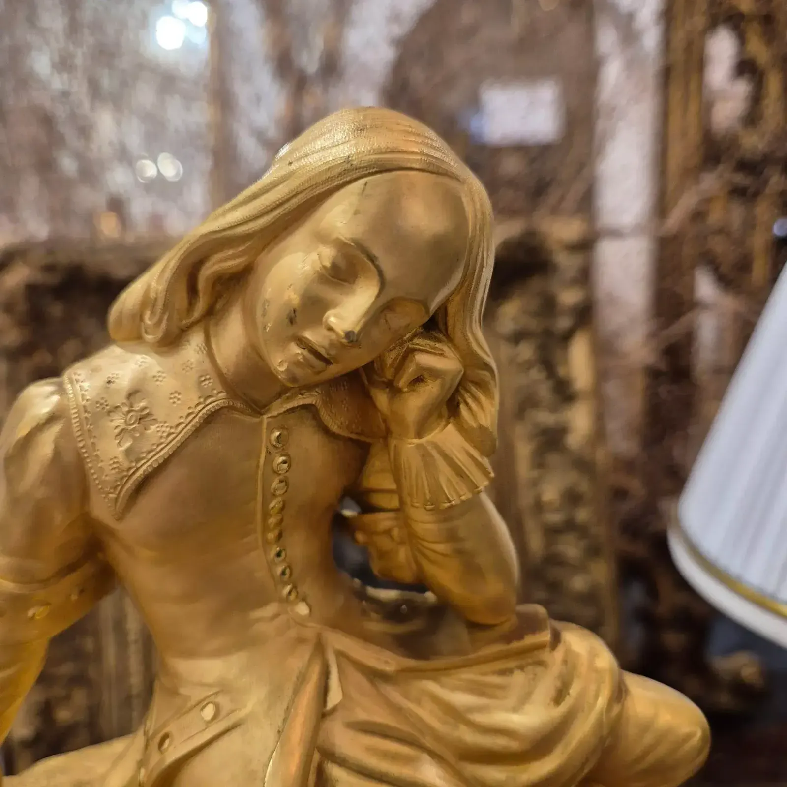 19th Century Charles X Clock With A Statue Of A Romantic Young Nobleman. photo buy