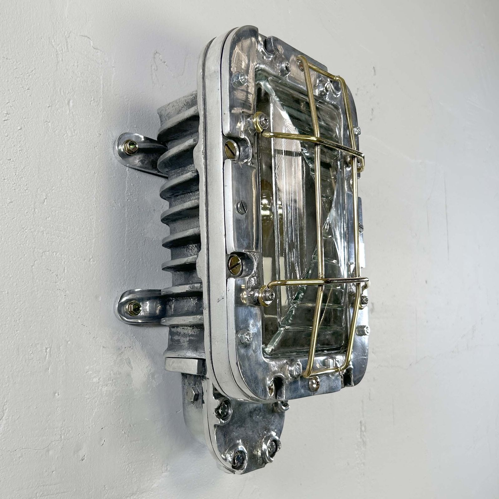 photo vintage Large Industrial Rectangular Aluminium Wall Light With Brass Cage