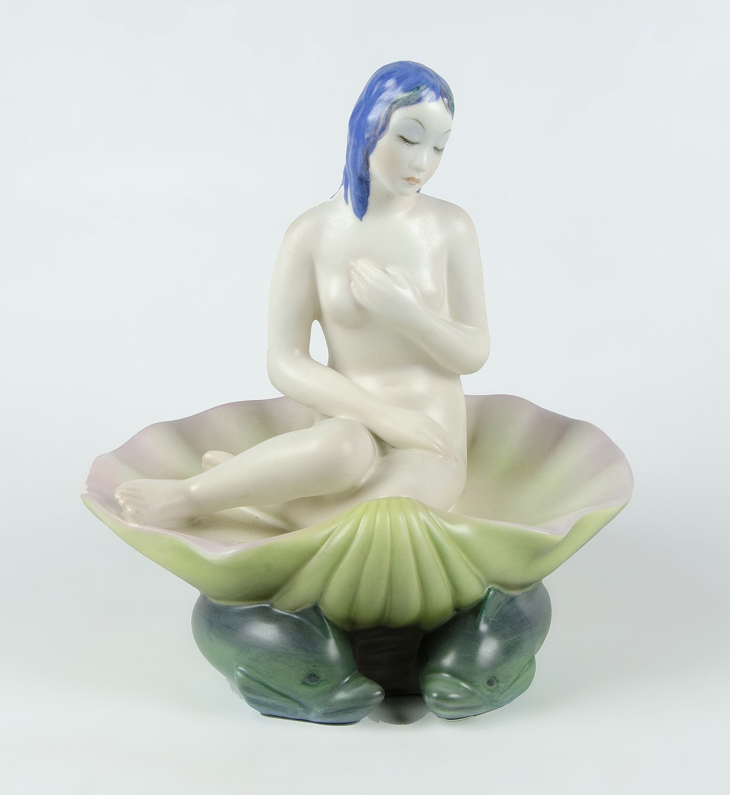 1930s Torino Glazed Porcelain Sculpture Of Seated Venus On Shell Over Dolphins, Manufactured By Lenci, Italy