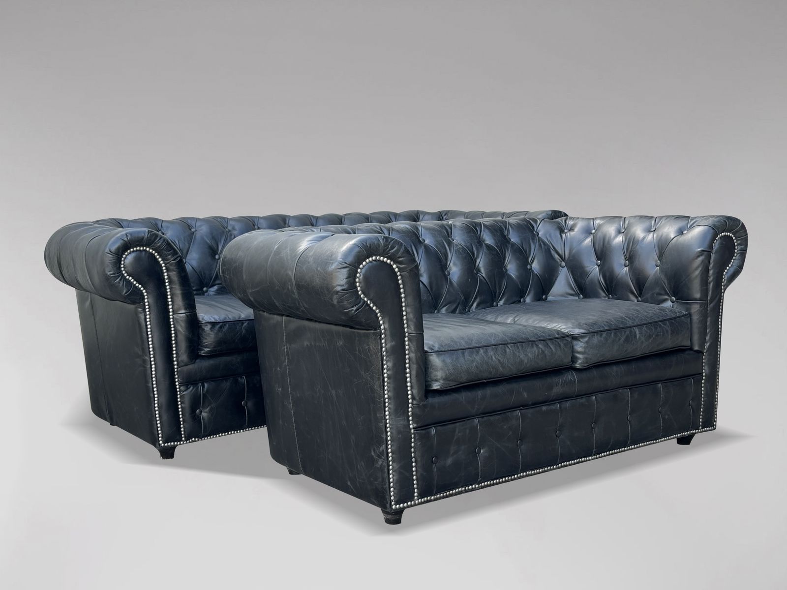 Two Seater Black Leather Chesterfield Sofa photo furniture
