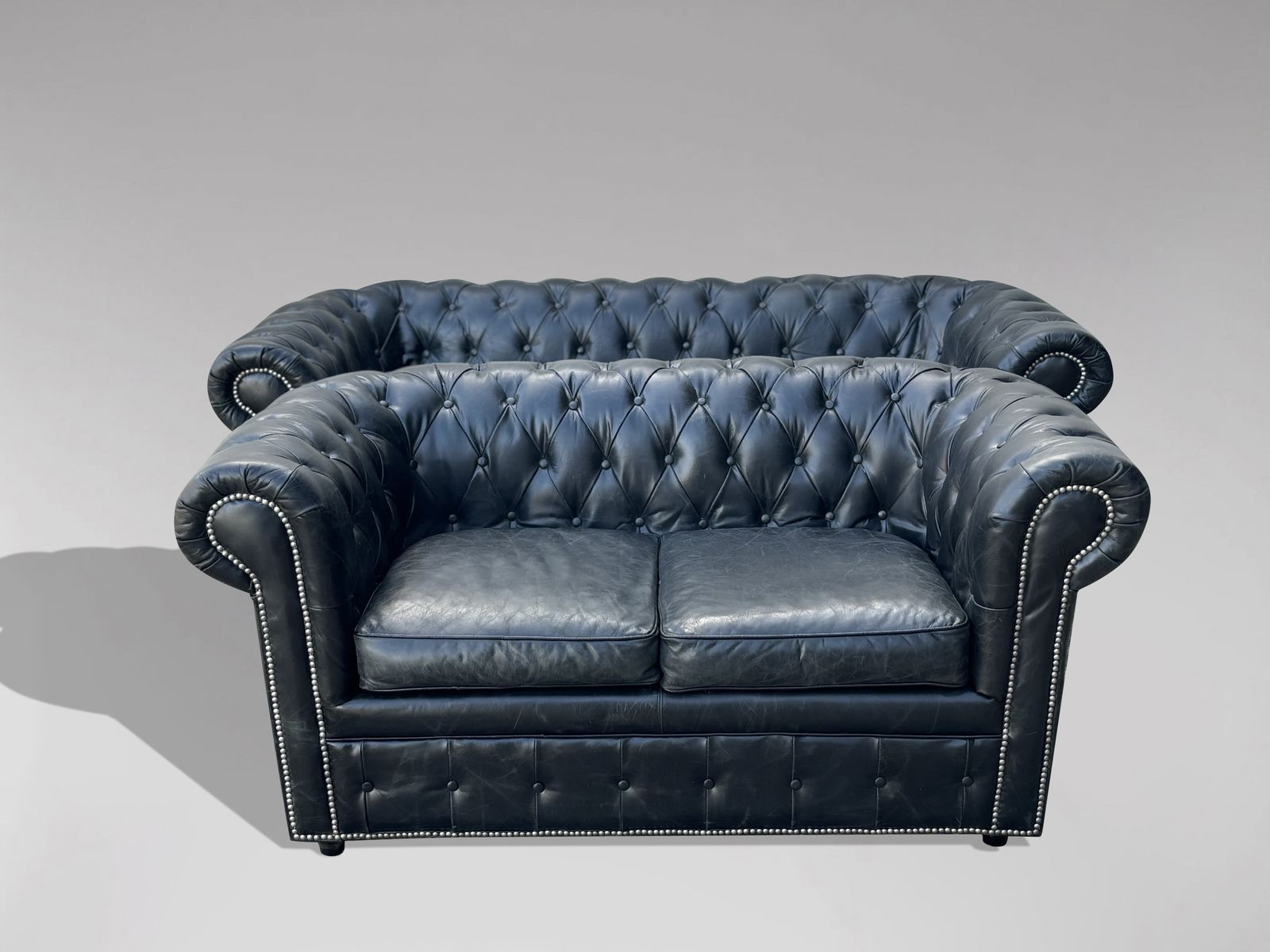 Two Seater Black Leather Chesterfield Sofa photo buy