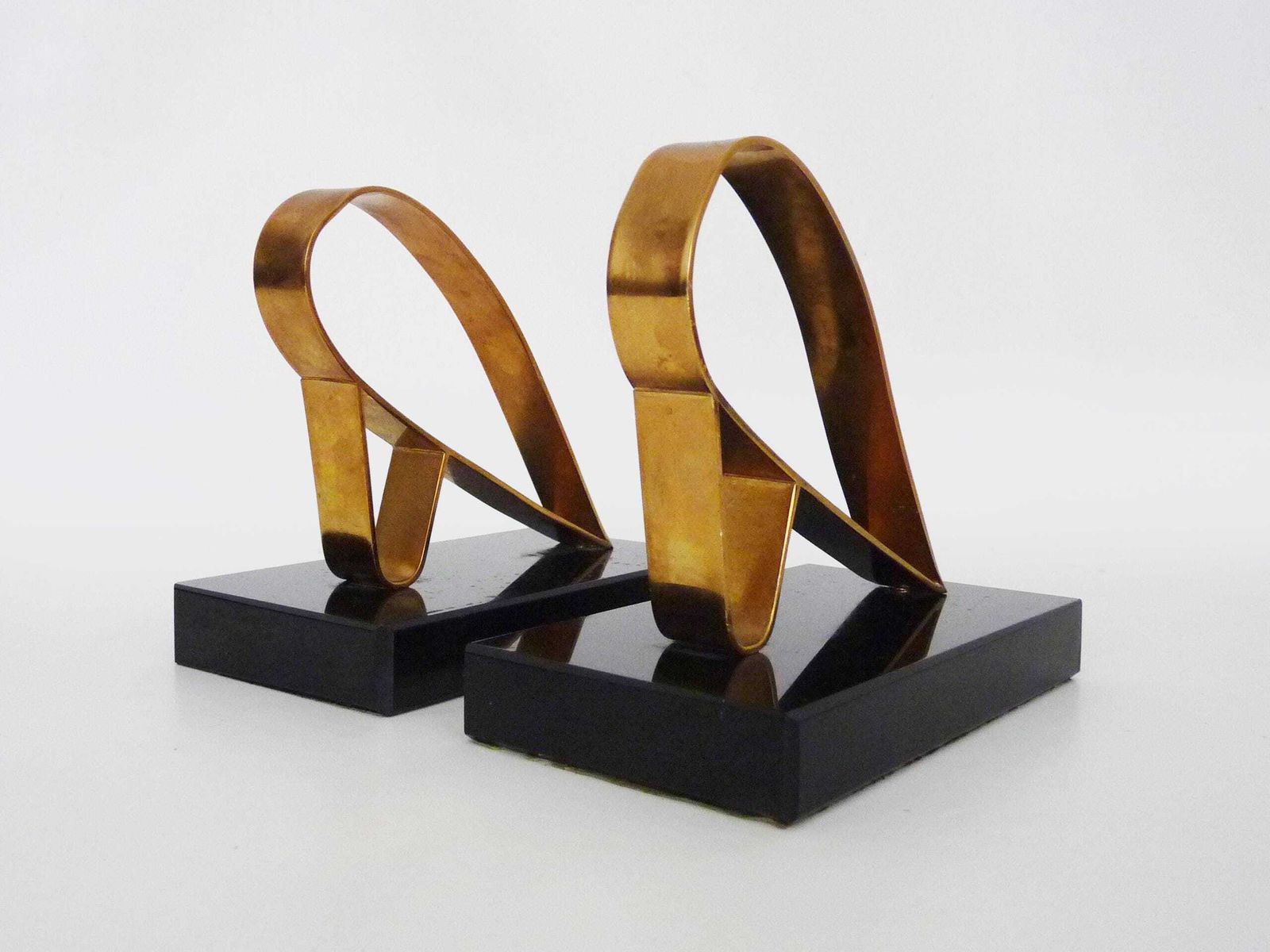 Pair Of Modernist Art Deco Gold Starry Bookends On A Black Marble Base. photo Home Decor