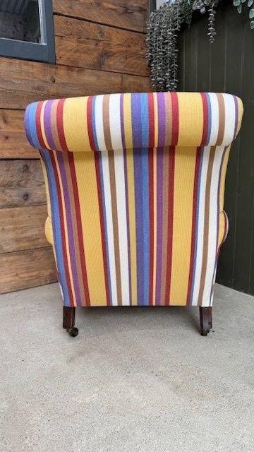 Traditionally Upholstered Country House Lounge Armchair With Brass Castors photo Furniture