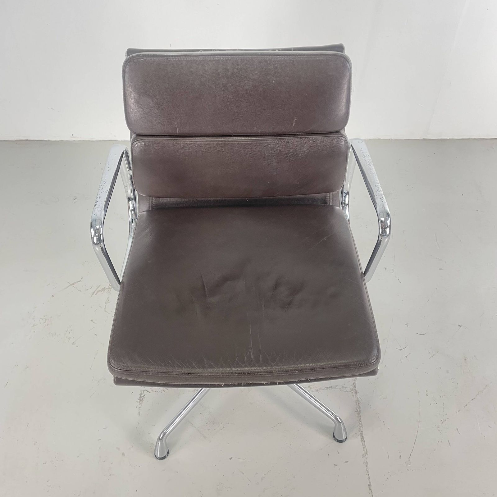 Furniture Eames Brown Leather Ea 208 Soft Pad Group Chair Made By Vitra For Herman Miller photo