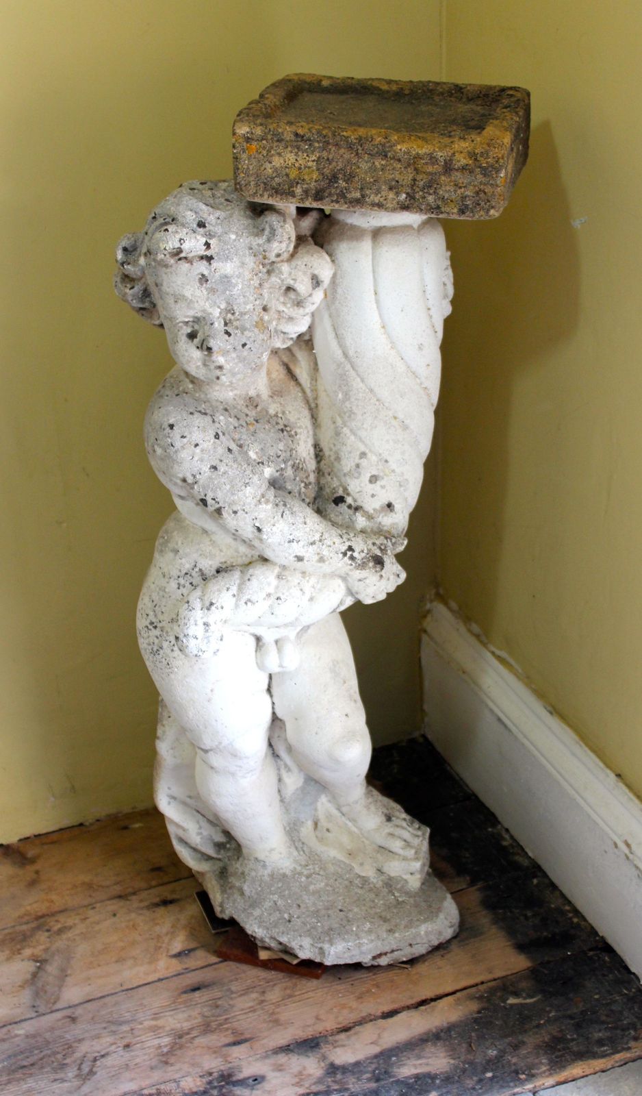 Statue Of A Boy Holding A Bird Bath photo for sale