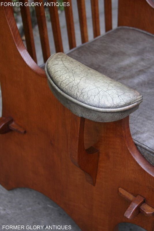 photo furniture A Rupert / Nigel Griffiths Carved Oak Derbyshire Wing Back Leather / Armchair