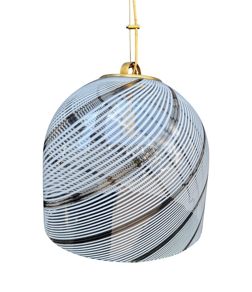 An Italian 1970s Large Murano Swirl Glass Pendant Light By Venini With Brass Top And Ceiling Rose. photo vintage