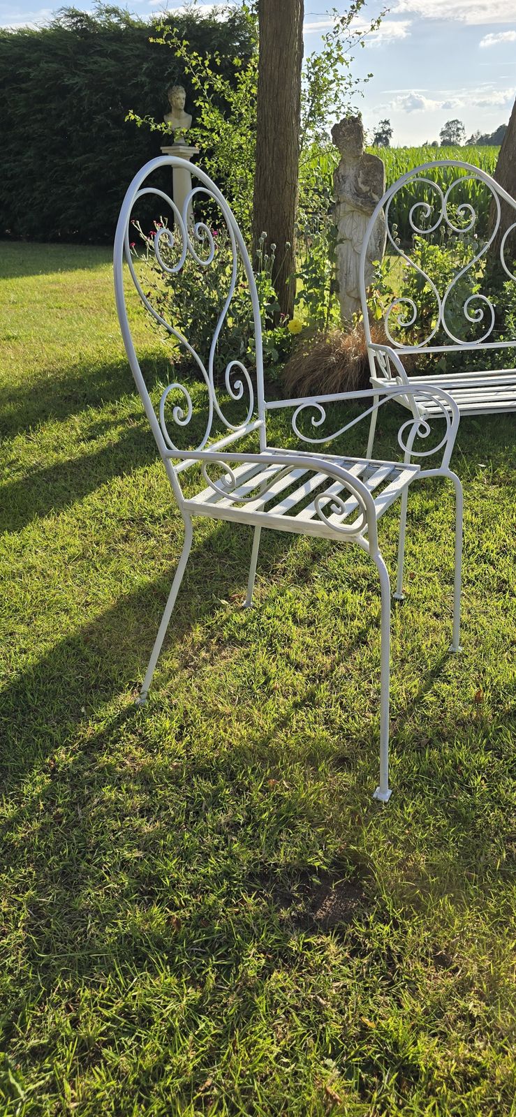Wrought Iron Bench And Two Chairs photo vinterior