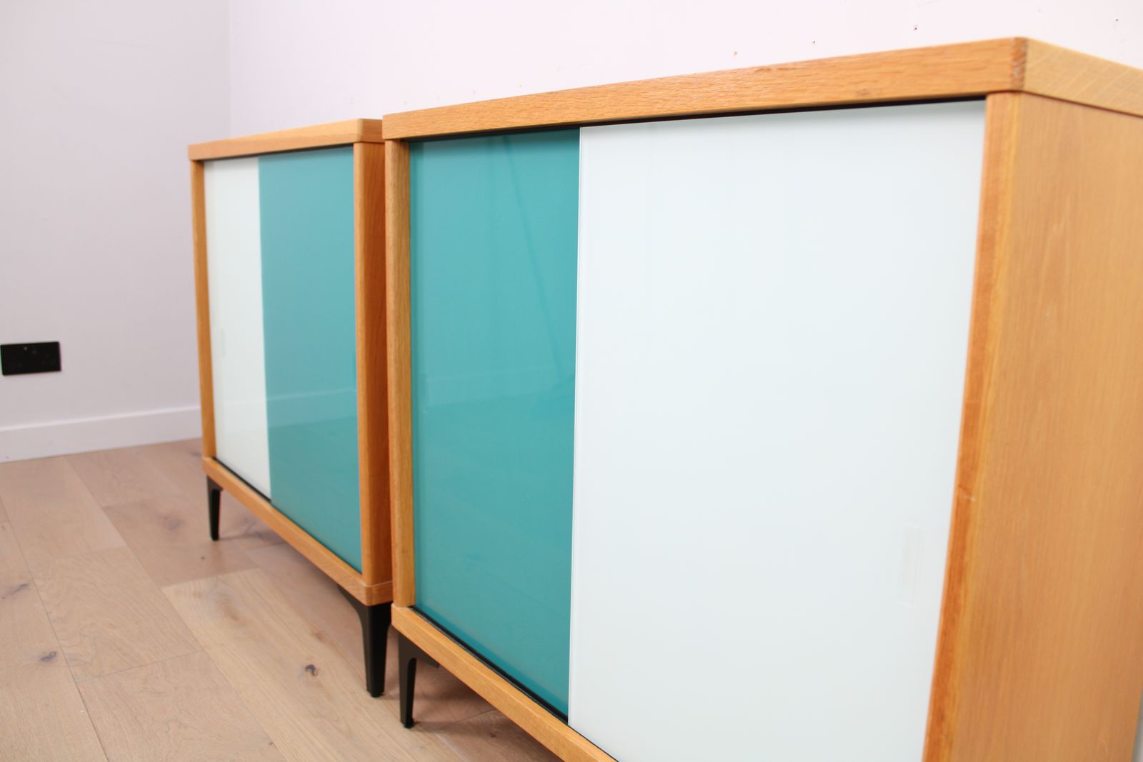 A Vintage Mid Century Bookcase With Teal And White Sliding Doors 1 Of 2 photo Furniture