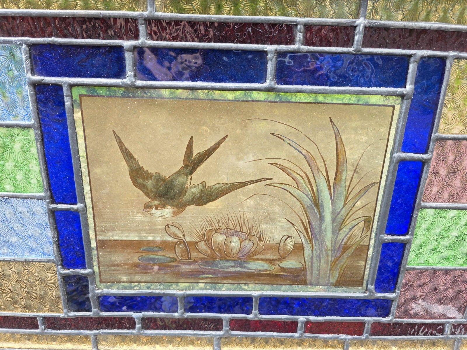 1900 Antique Leaded Glass Window With Bird On Flight Design photo for sale