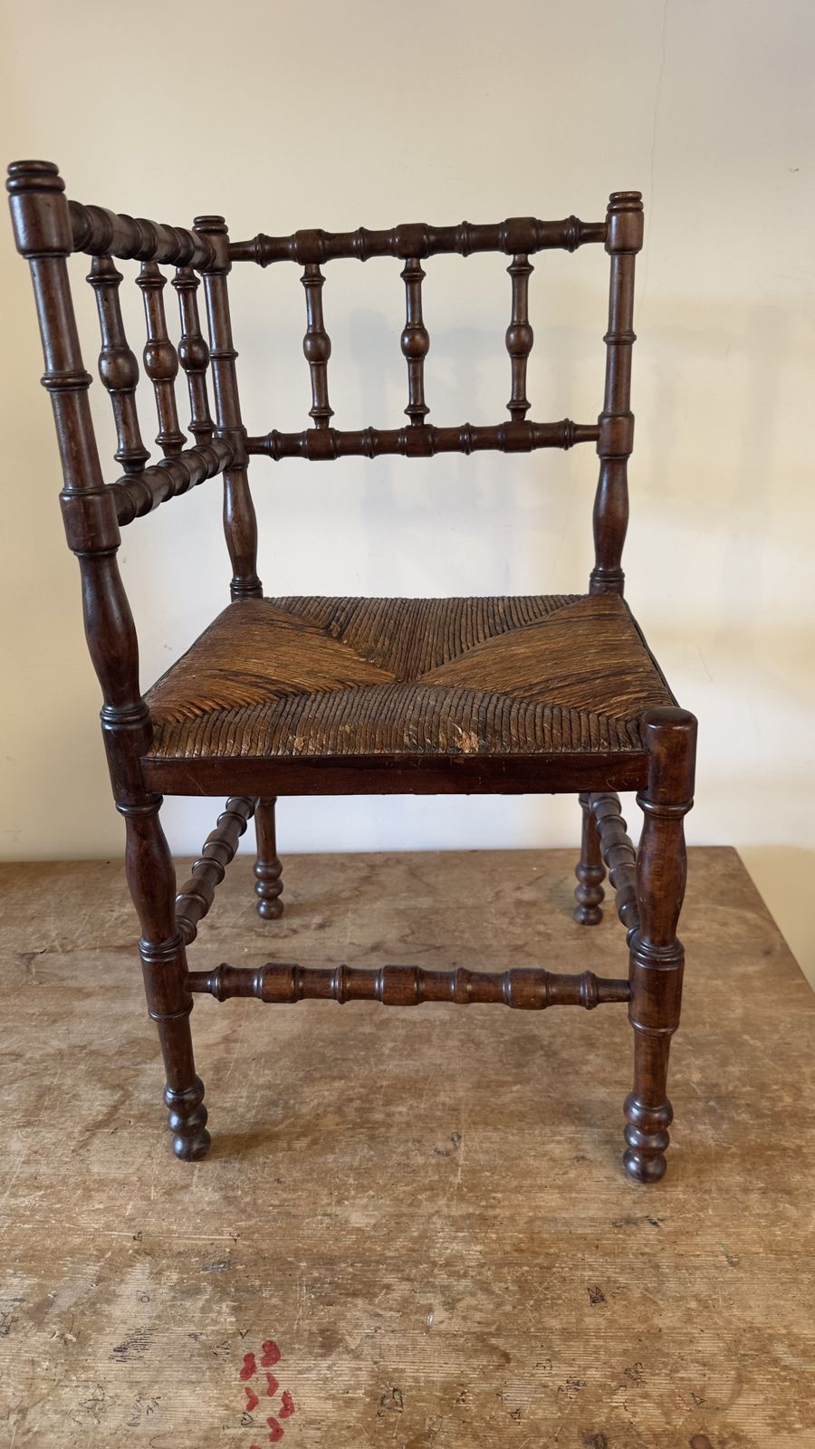 Vintage French Bobbin Corner Chair With A Woven Raffia Seat. photo buy