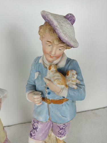 photo for sale Two Statue Figurines  Porcelain  Porcelain Antique Germany Boy Puppies Girl Kitt