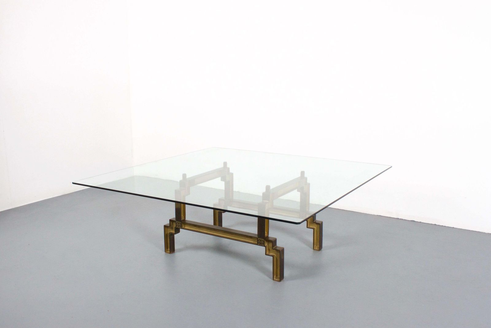 Sculptural Bronze And Glass Coffee Table By Peter Ghyczy photo furniture