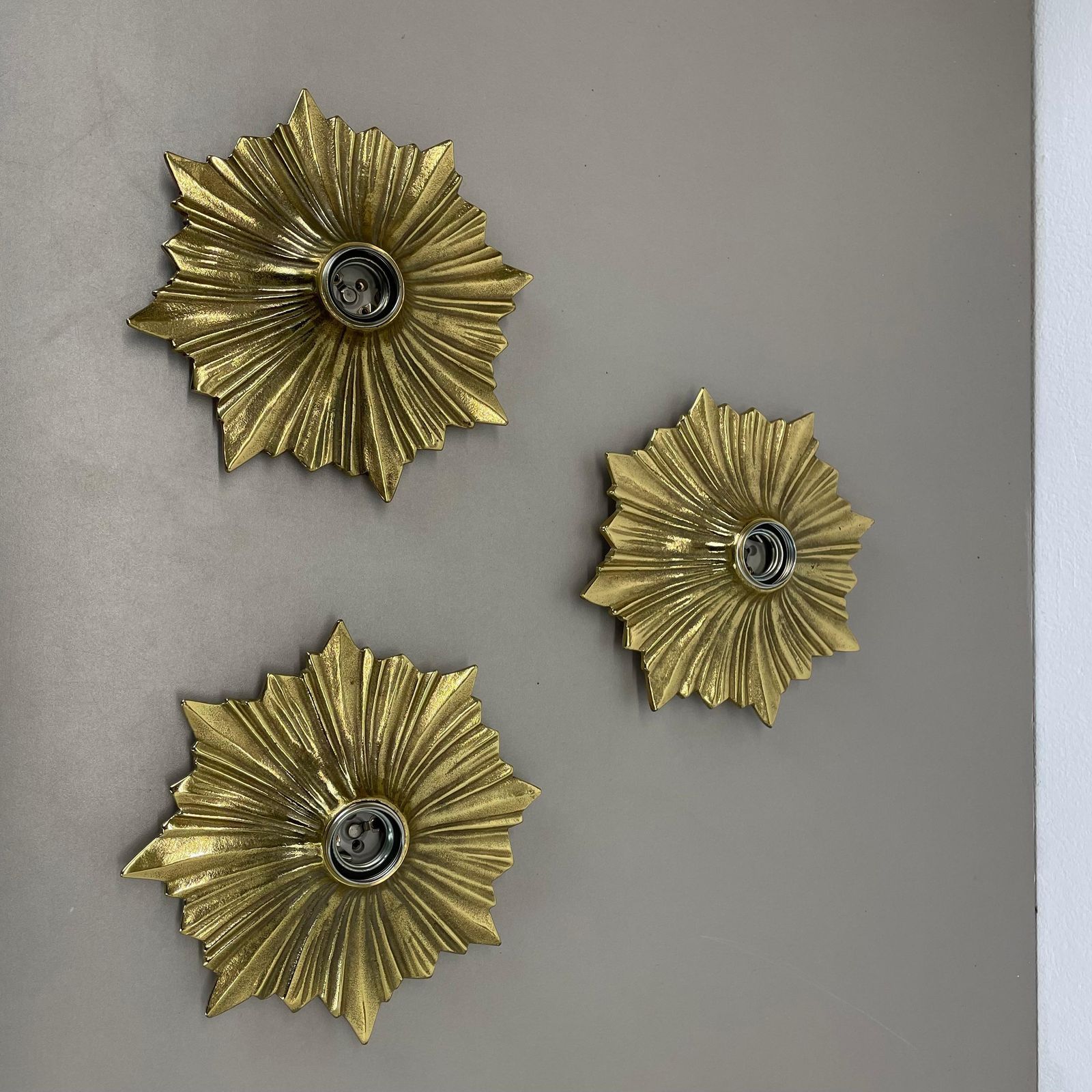 Set Of Three Brutalist Bronze Sunburst Wall Ceiling Light Sconces, Italy 1950s photo vinterior