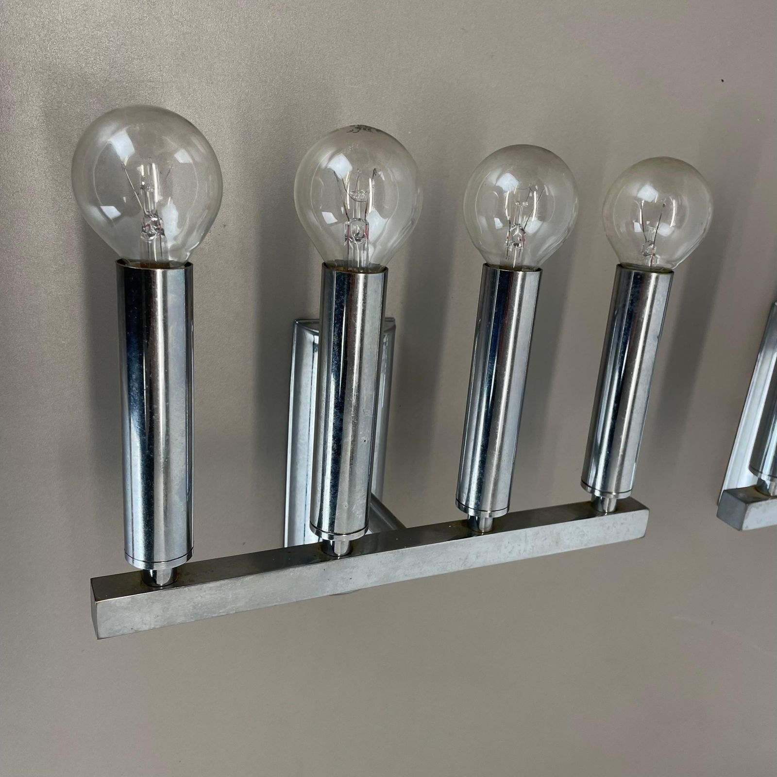 photo for sale Set Of 2 Chrome Tube "Torch" Wall Lights By Gaetano Sciolari Attrib. Italy 1970s