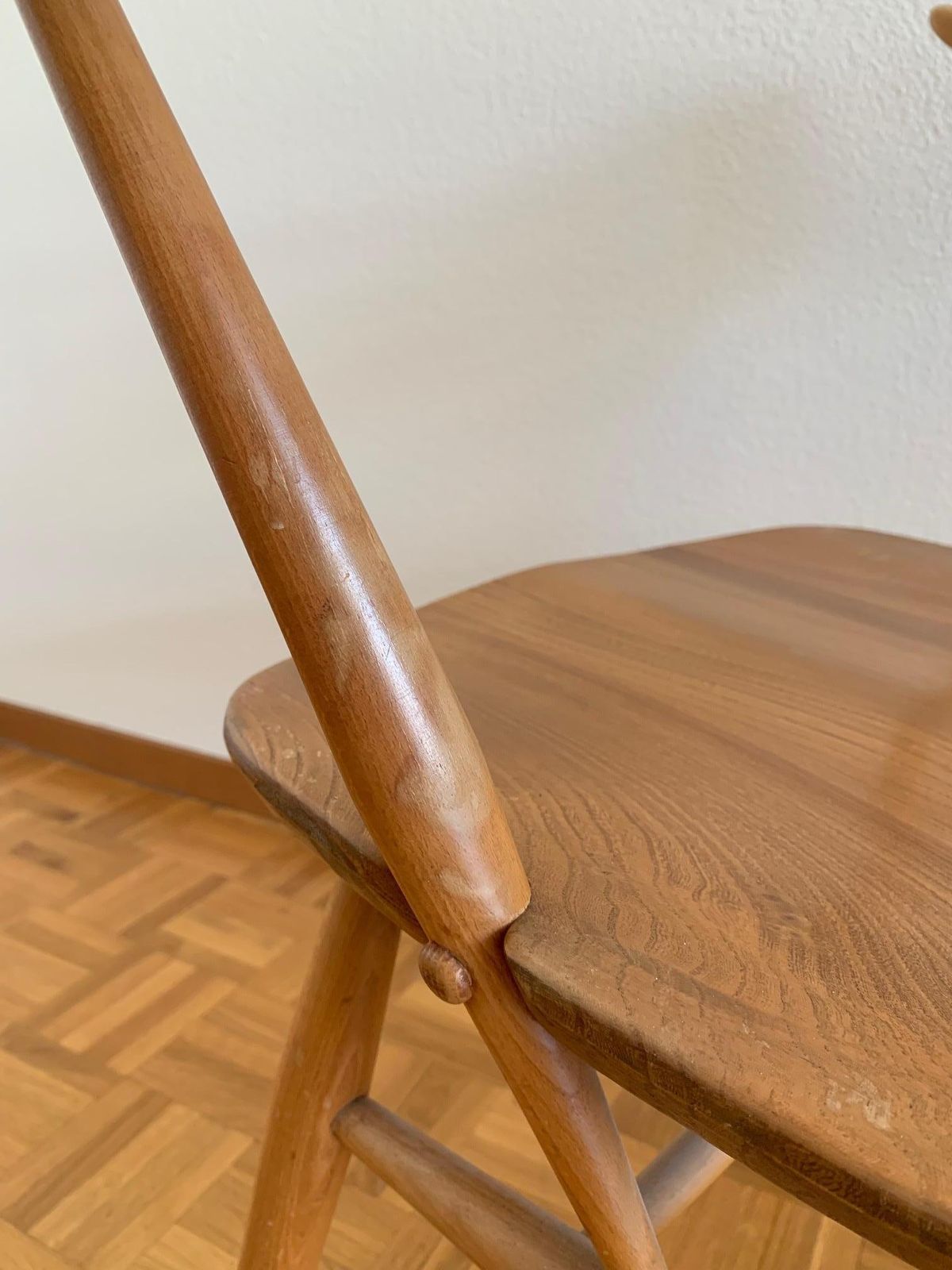 photo buy Elegant Pair Of Elm And Beech Easy Chairs By Ercol, Uk, 1950s. Model 493.