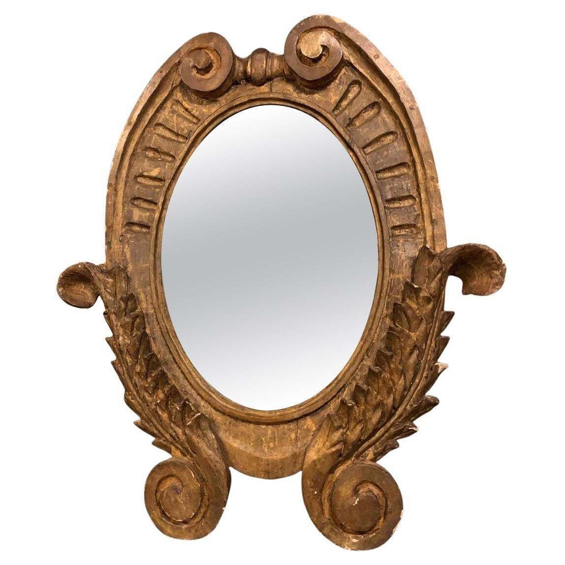 Oval Wall Mirror In Carved And Gilded Wood, Italy