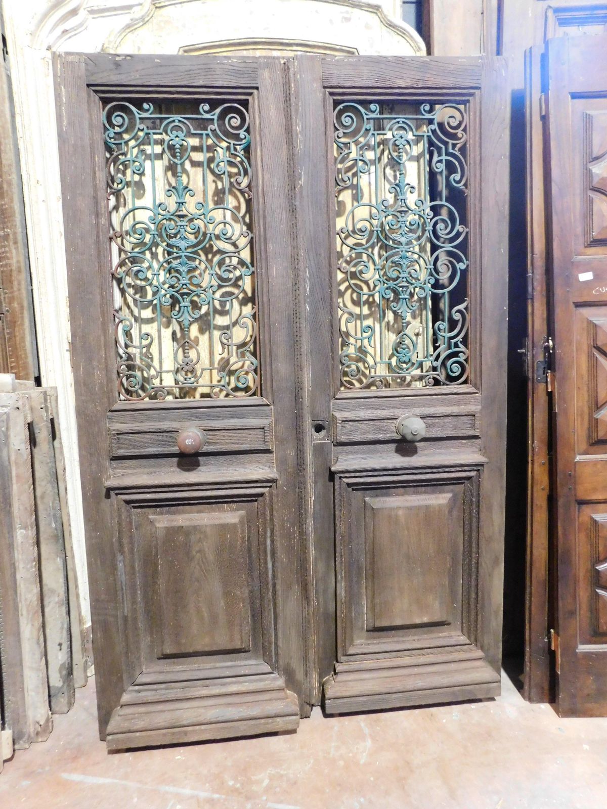 Entrance Door, Main Door In Oak Wood, Two Doors, With Green Iron Grille, Italy photo Home Fixtures
