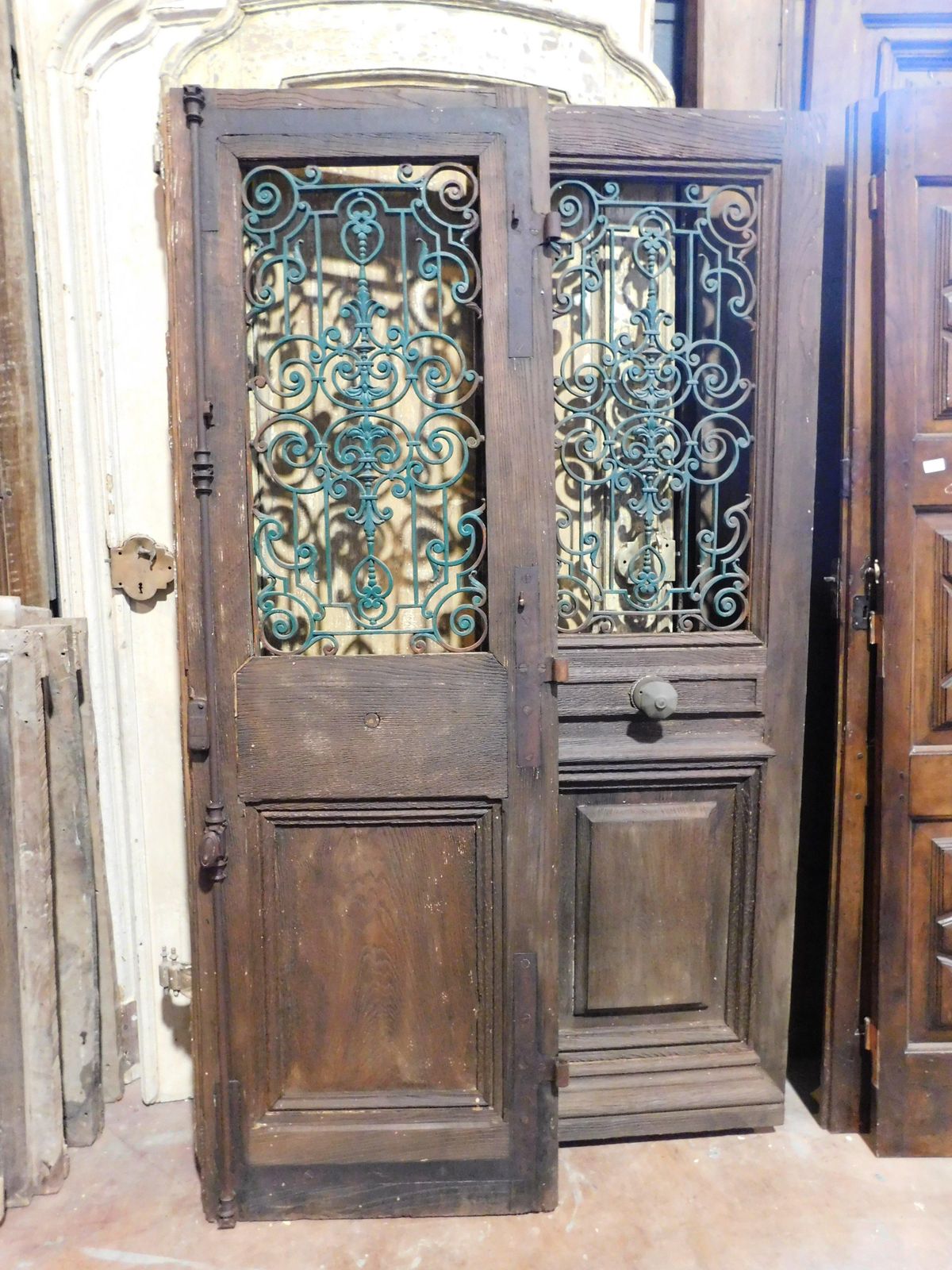 Home Fixtures Entrance Door, Main Door In Oak Wood, Two Doors, With Green Iron Grille, Italy photo