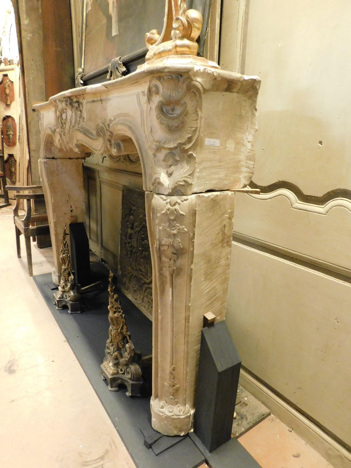 photo buy Fireplace Mantle In Richly Carved Burgundy Stone And Wavy Shape, Italy