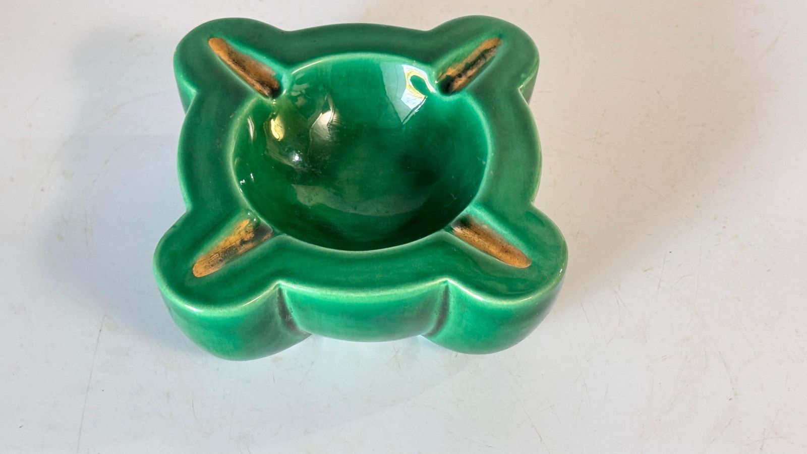 photo for sale 1940s French Art Deco Green Ceramic Ashtray With Gilded Details, Four Cigarette