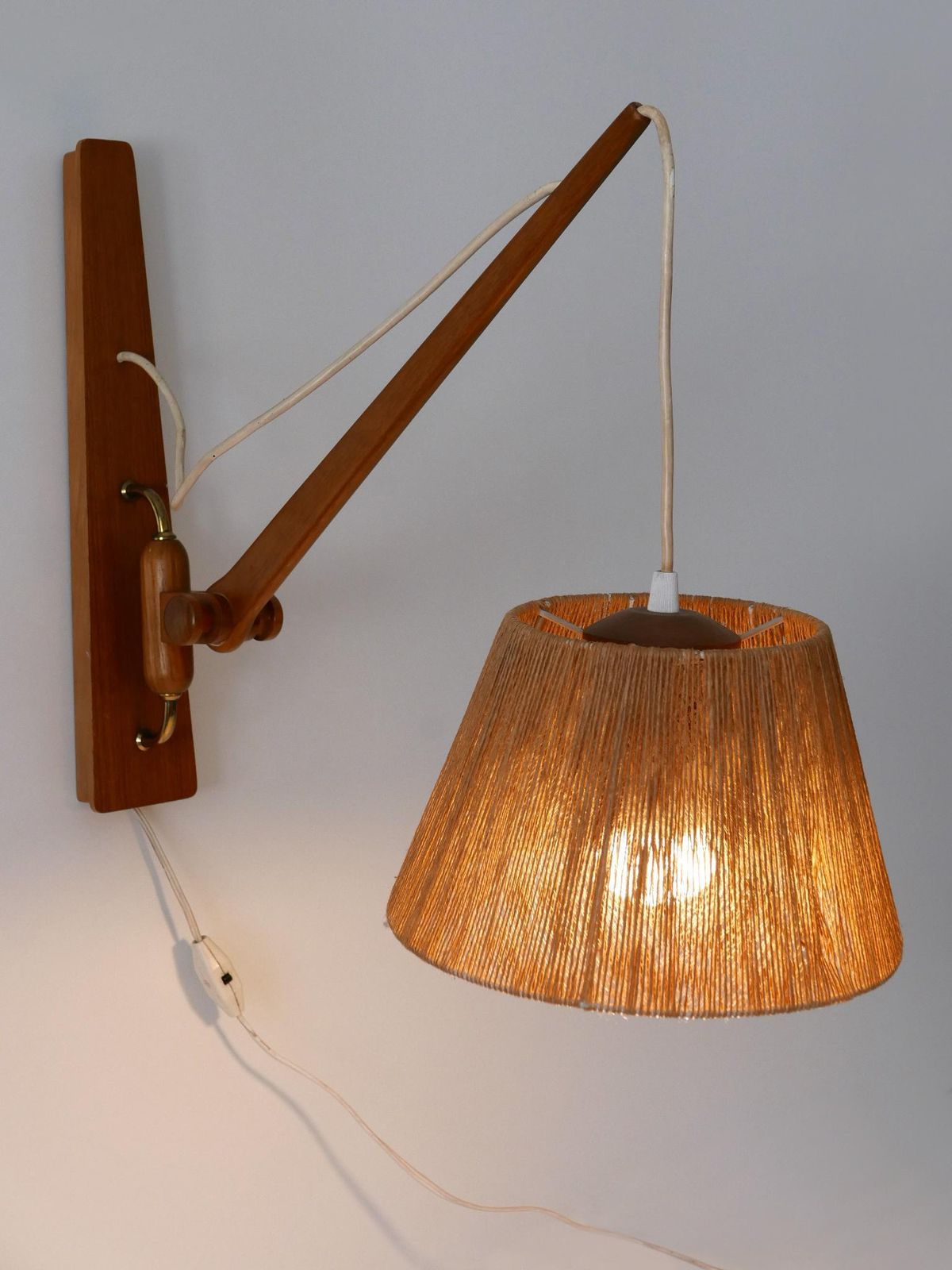 2426.0 Elegant Mid Century Modern Swing Teak & Sisal Wall Light Denmark 1960s photo