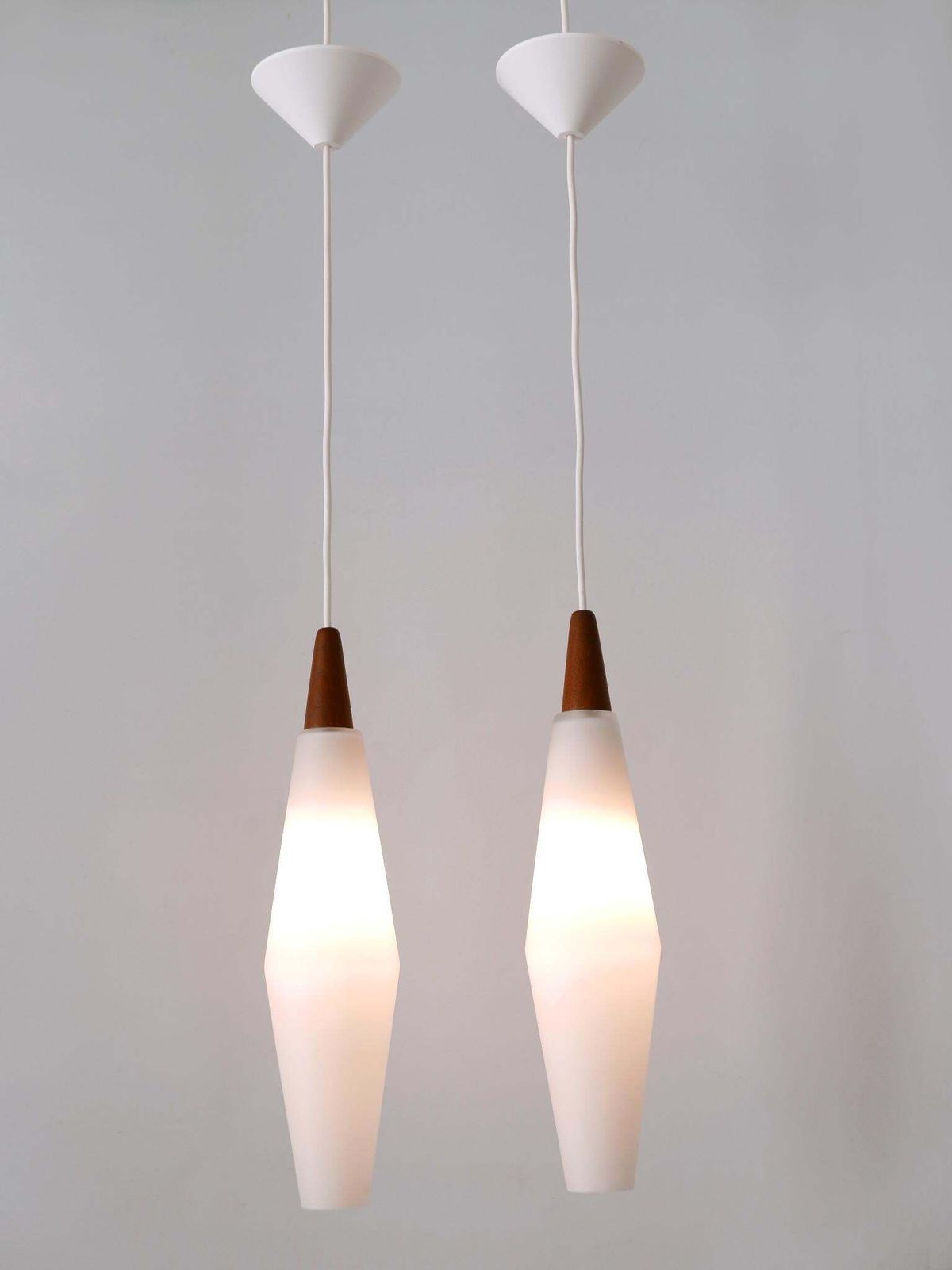 1593.0 Set Of Two Elegant Scandinavian Opaline Glass & Teak Pendant Lamps 1960s photo
