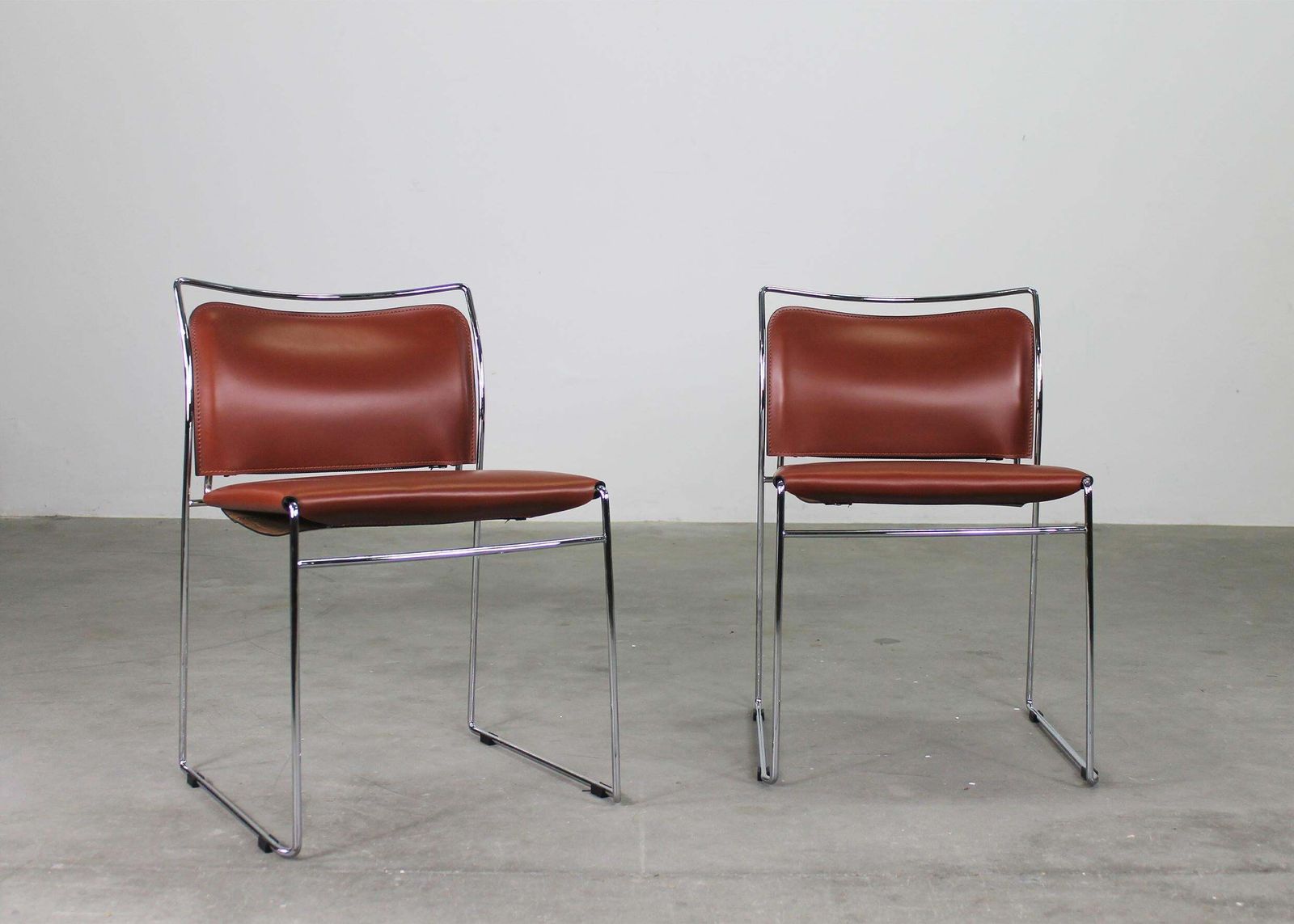 photo for sale Kazuhide Takahama Set Of Twelve Tulu Chairs In Leather And Steel By Simon Gavina