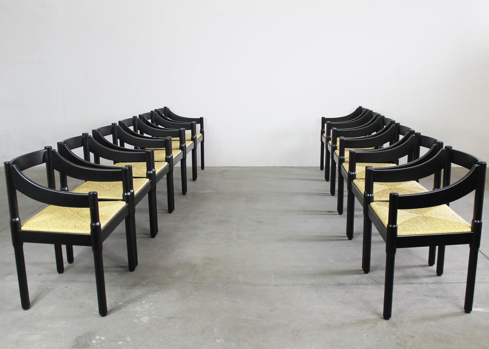 Vico Magistretti Set Of Twelve Black Carimate Chairs By Cassina 1960s photo vintage