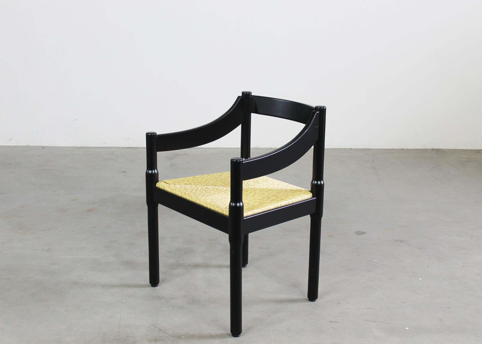 16552.0 Vico Magistretti Set Of Twelve Black Carimate Chairs By Cassina 1960s photo