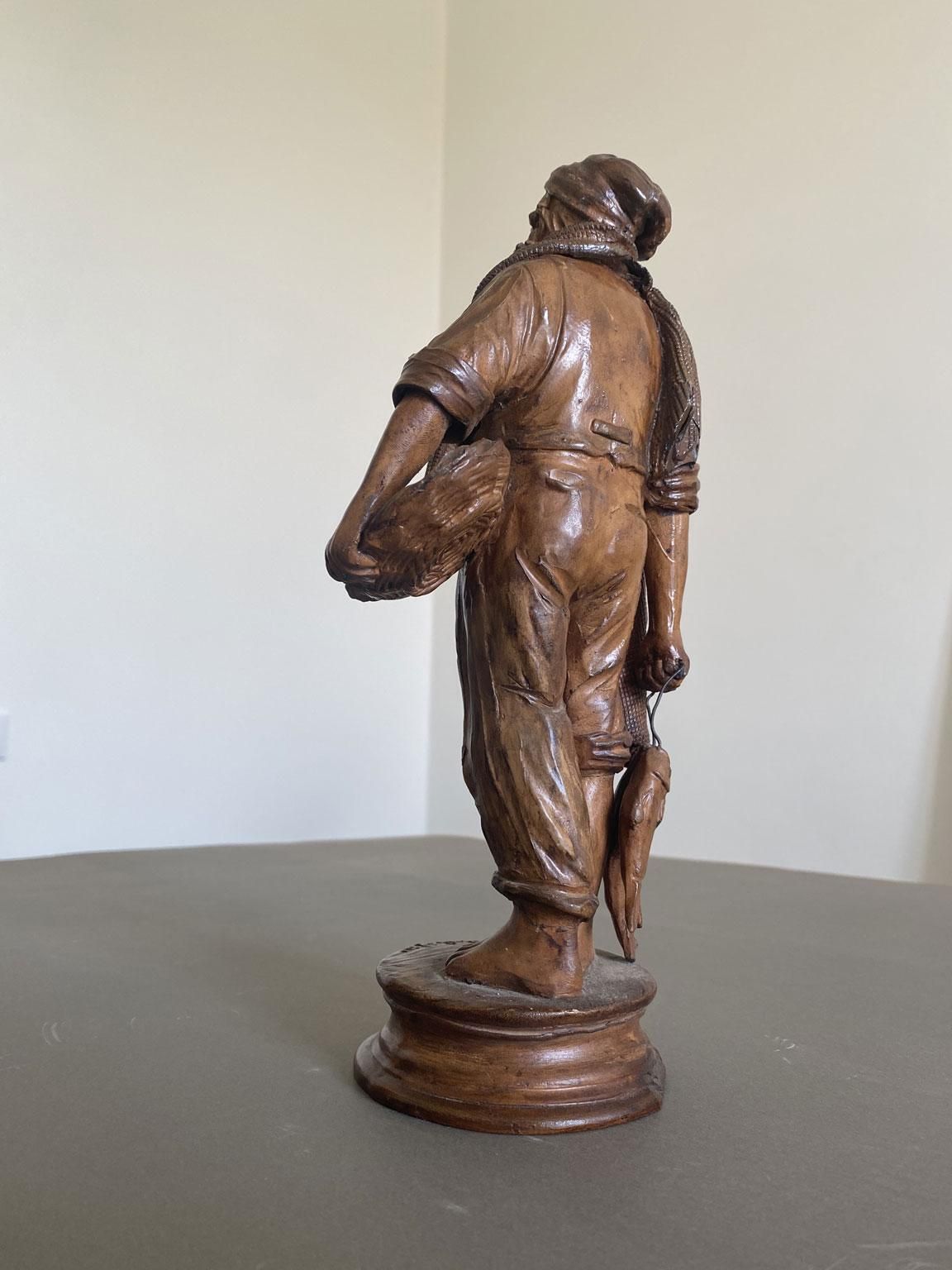 743.0 Italy Late 20th Century Carved Wooden Fisherman Sculpture photo