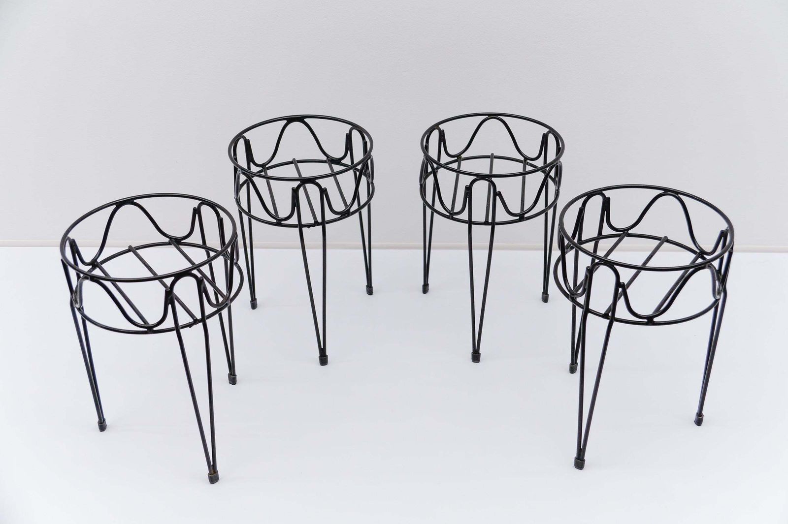 photo vintage Set Of Four Mid Century Modern String Metal Flower Stands, 1950s Sweden