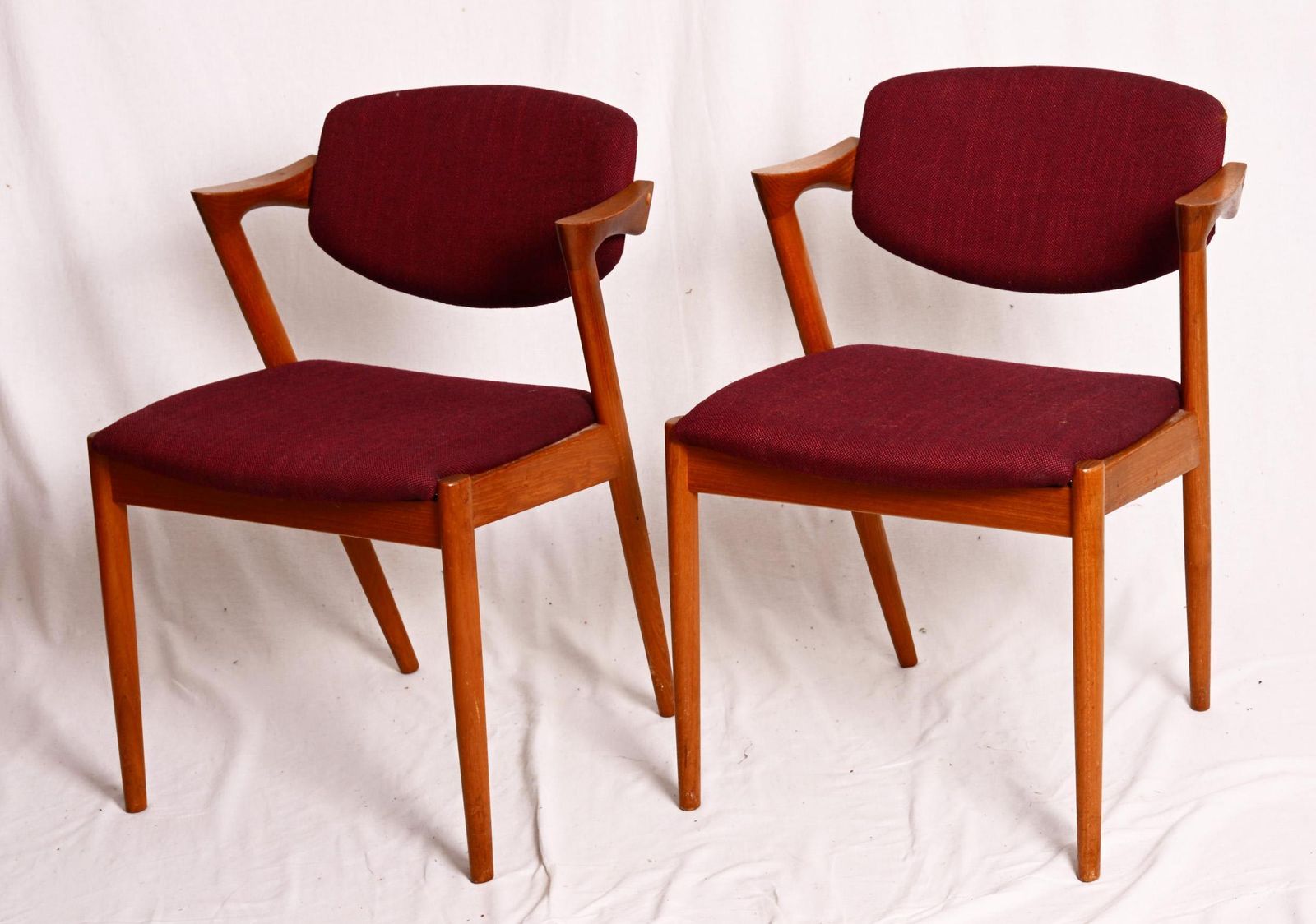 A Pair Of Teak Dining Chairs By Kai Kristiansen Model 42 photo for sale