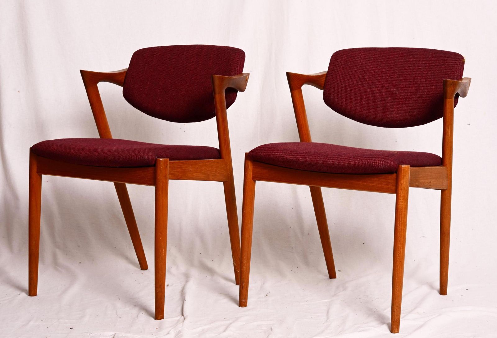 A Pair Of Teak Dining Chairs By Kai Kristiansen Model 42 photo Furniture