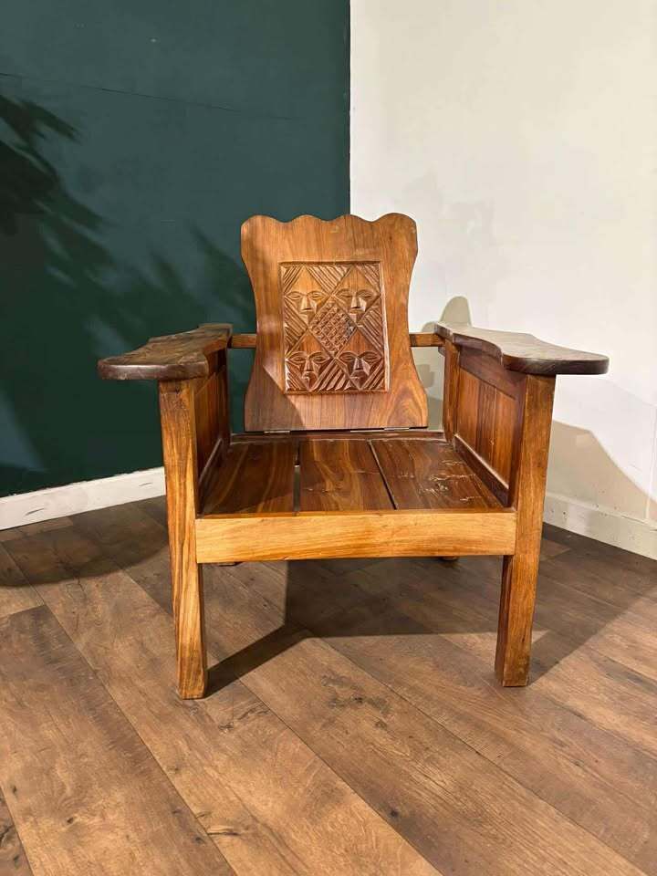 389.0 Adjustable Decorative Chair With Tribal Inspired Carvings photo