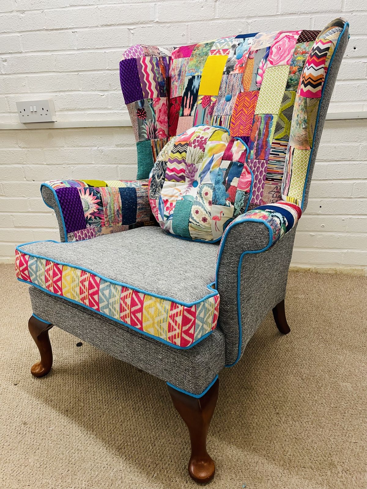 photo furniture Parker Knoll Wingback Chair Reupholstered In Bright Colours Patchwork Design