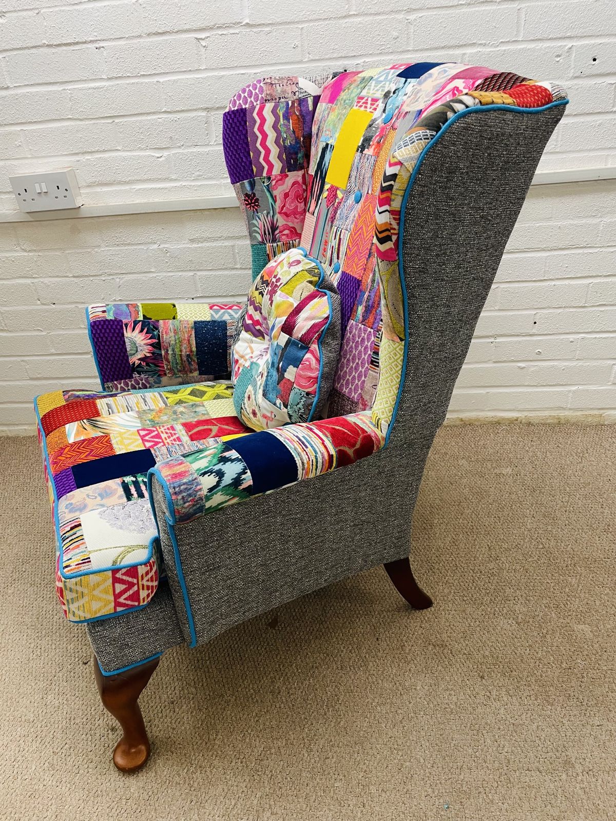 photo for sale Parker Knoll Wingback Chair Reupholstered In Bright Colours Patchwork Design
