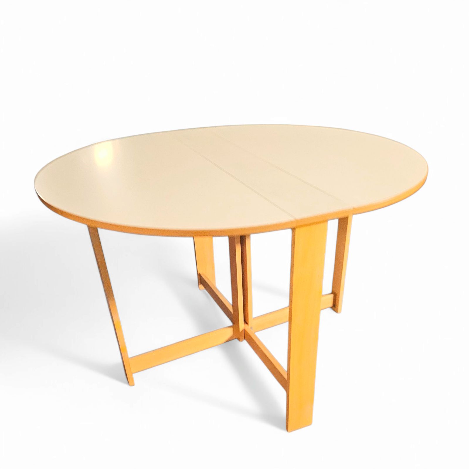 Furniture Vintage Scandinavian Folding Dining Table With Side Leaves. The Oval Top Is Made Of White Formica photo