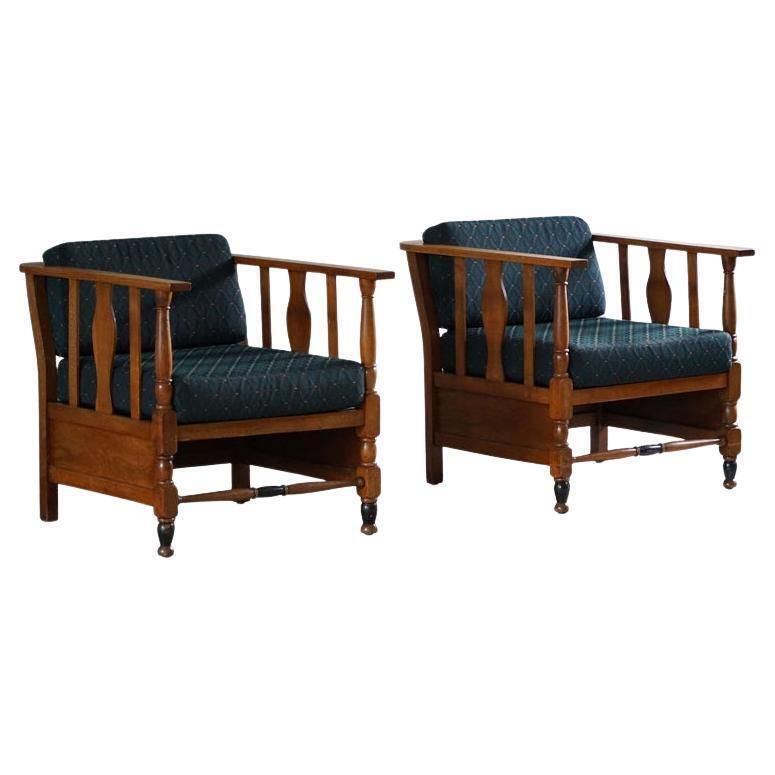 Art Nouveau, Pair Of Lounge Chairs In Oak, Reupholstered In Style Fabric, 1920s