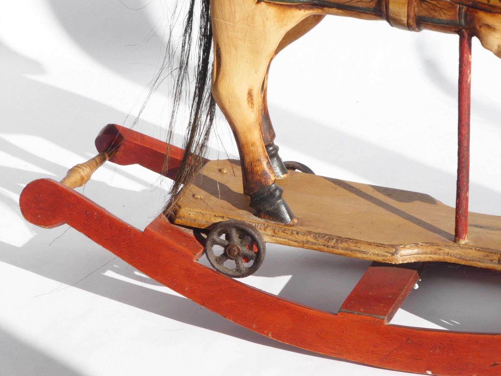 photo furniture Wood Carved Rocking Horse With Glass Eyes, Carousel Horse With Floral Painted Details, Old Animal Toy On Wheels, Art Object