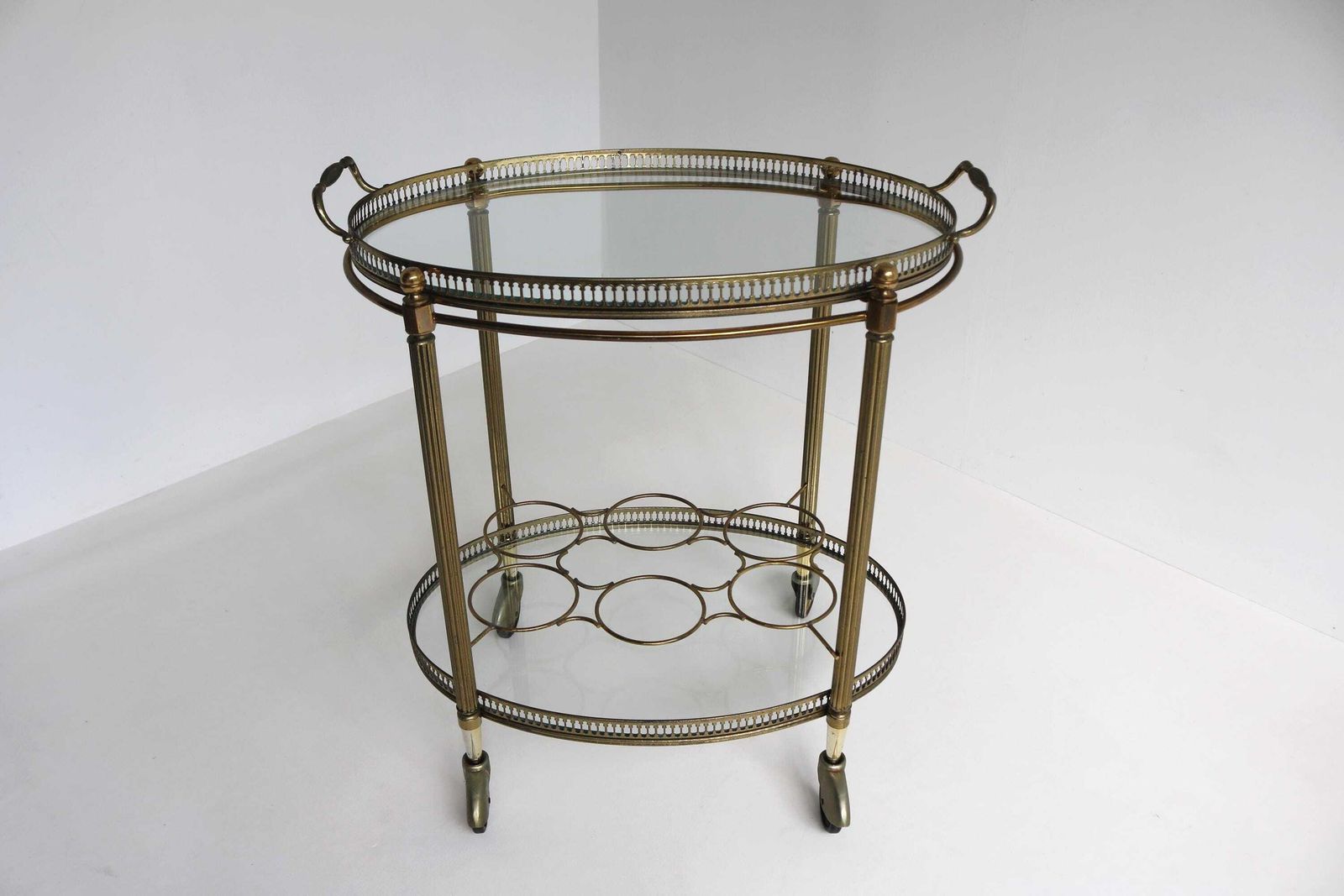Vintage Gilt Metal Oval Bar Cart Hollywood Regency Glass Trolley Removable Tray & Bottle Rack In The Style Of Maison Jansen France Ca. 1940s photo furniture