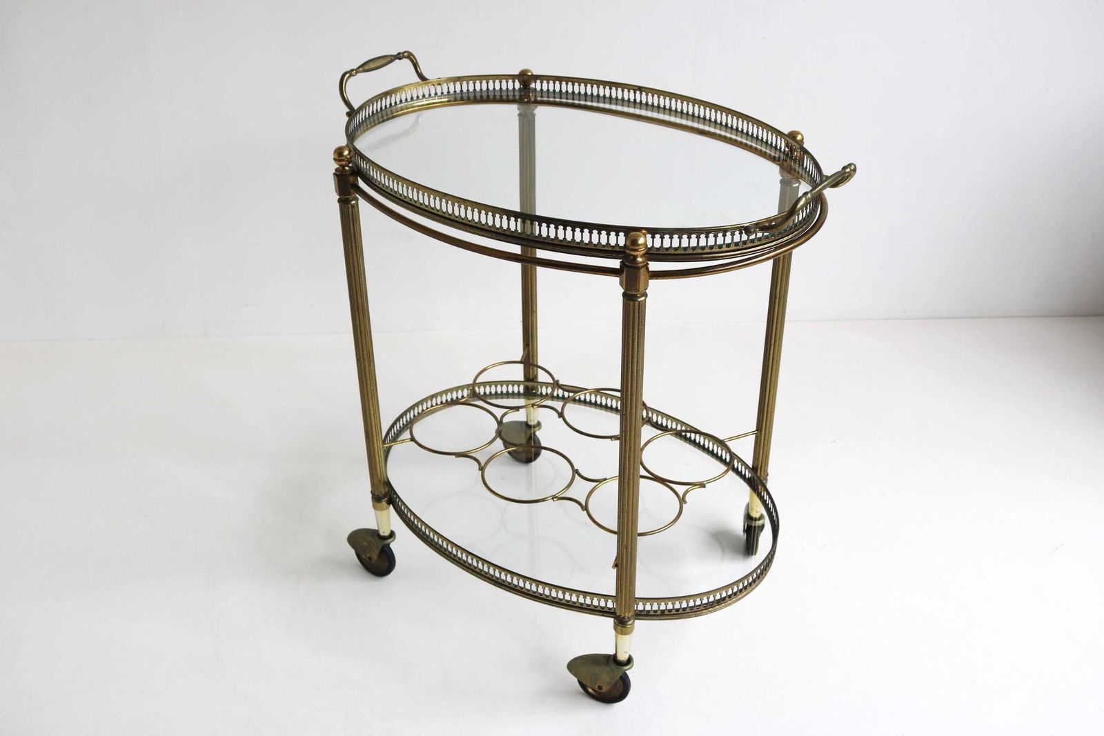 Vintage Gilt Metal Oval Bar Cart Hollywood Regency Glass Trolley Removable Tray & Bottle Rack In The Style Of Maison Jansen France Ca. 1940s photo vinterior