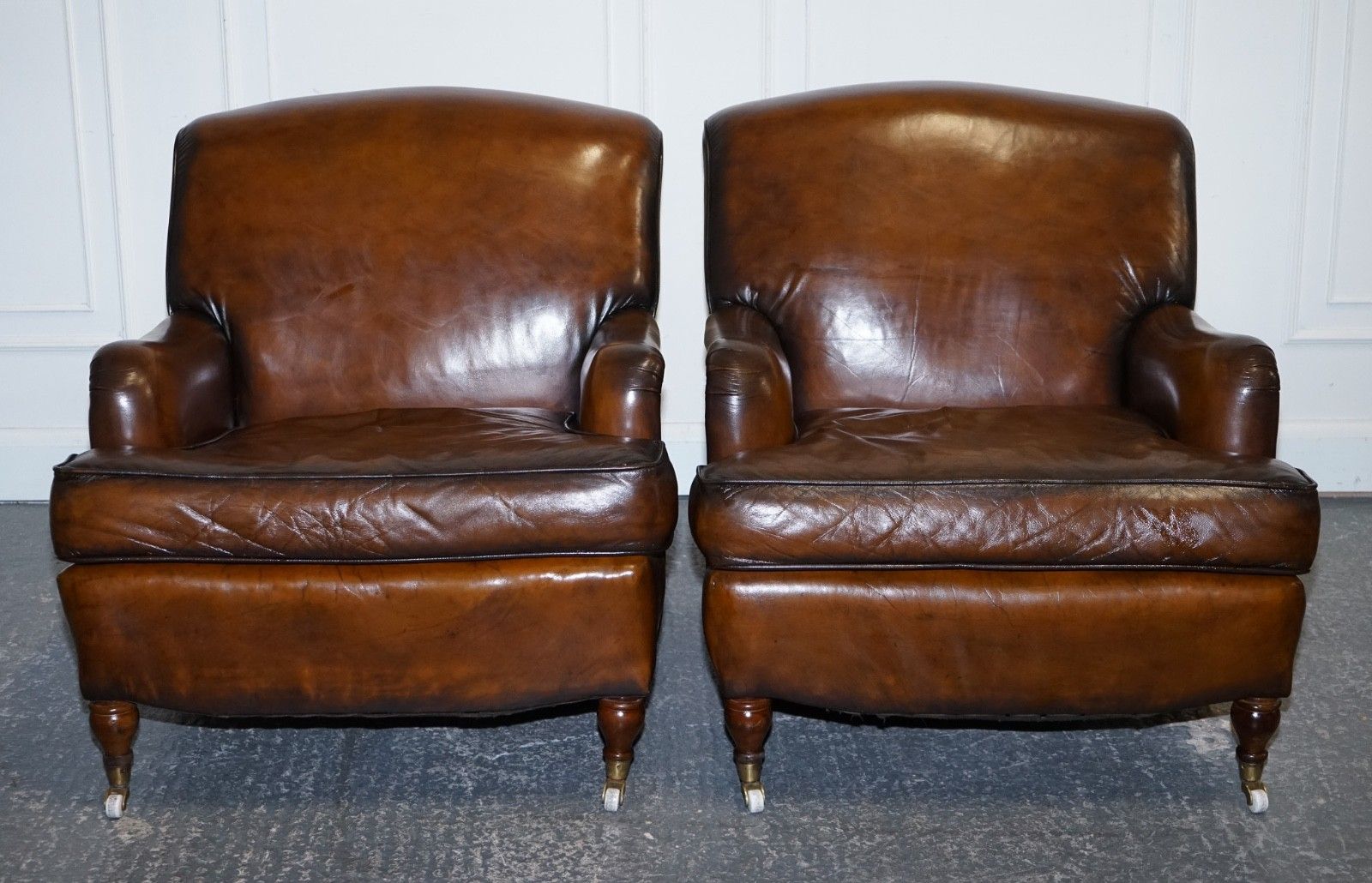 Pair Of Cigar Hand Dyed Leather Howard & Sons Style Armchairs On Castor Feet photo for sale