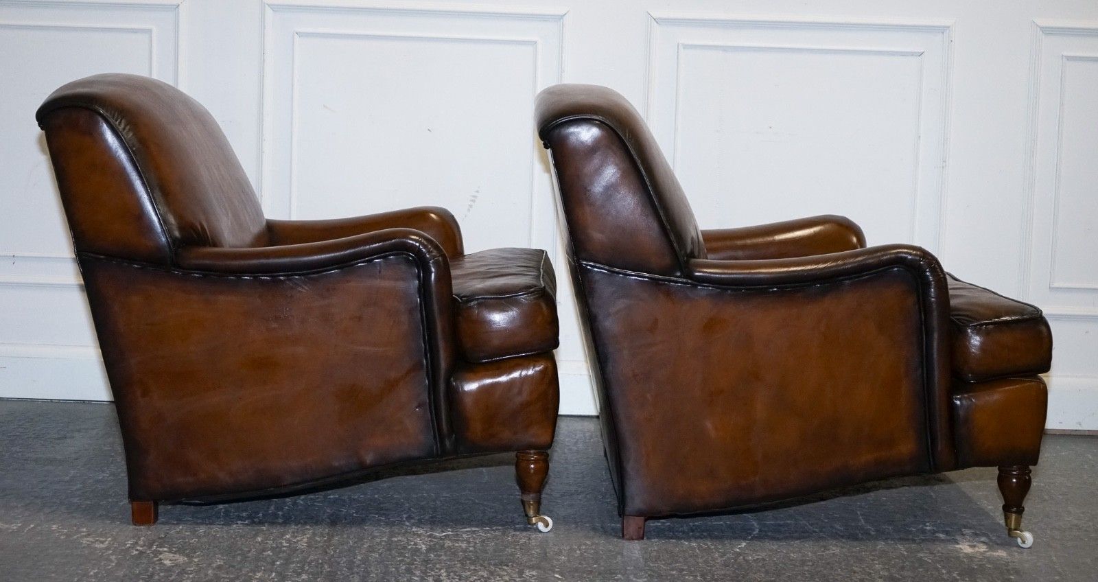 5250.0 Pair Of Cigar Hand Dyed Leather Howard & Sons Style Armchairs On Castor Feet photo