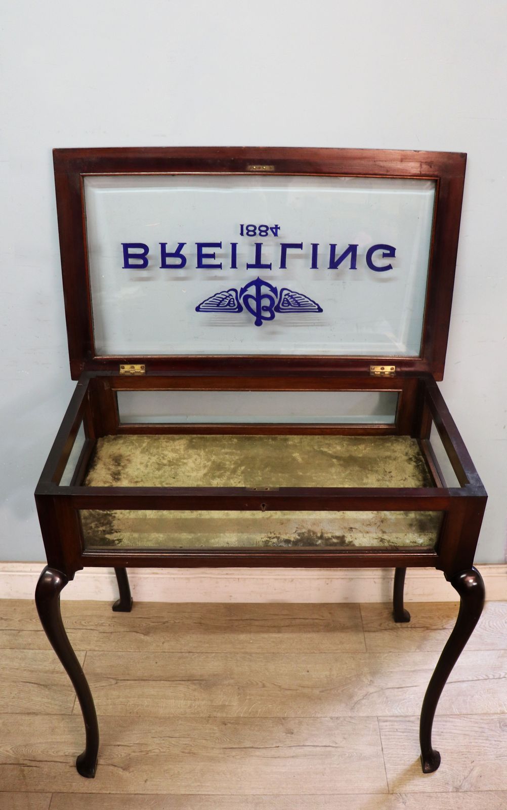 A Wonderful Vintage Bijouterie Display Table And Sign Written Detail For Breitling Watches. photo 495.0