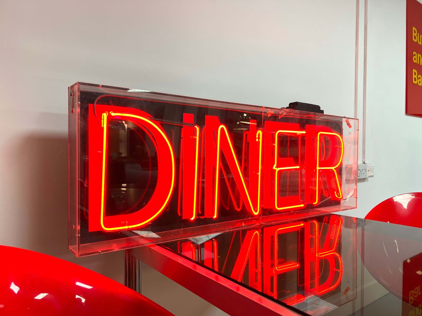 Red Neon ‘Diner’ Sign With Vintage Aesthetic photo 645.0