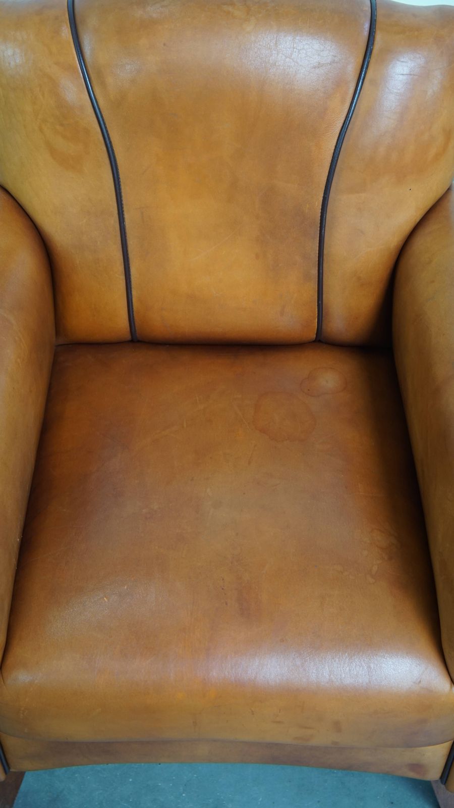 Beautiful Sheepskin Design Armchair With A Luxurious Finish With Dark Brown Piping photo 891.0
