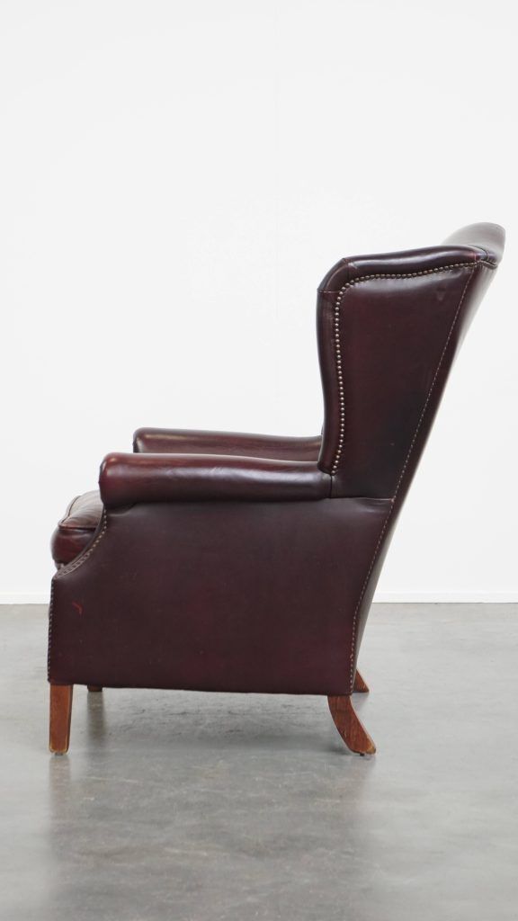 Charming And Comfortable Burgundy Red Cowhide Wing Chair In English Style With A Beautiful Patina photo 953.0