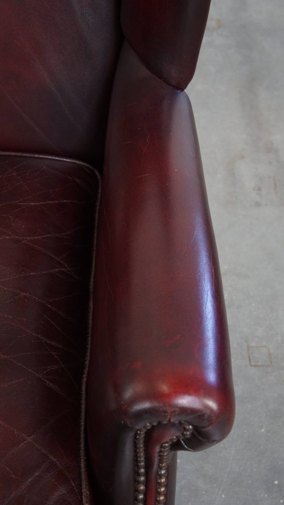 Charming And Comfortable Burgundy Red Cowhide Wing Chair In English Style With A Beautiful Patina photo vintage