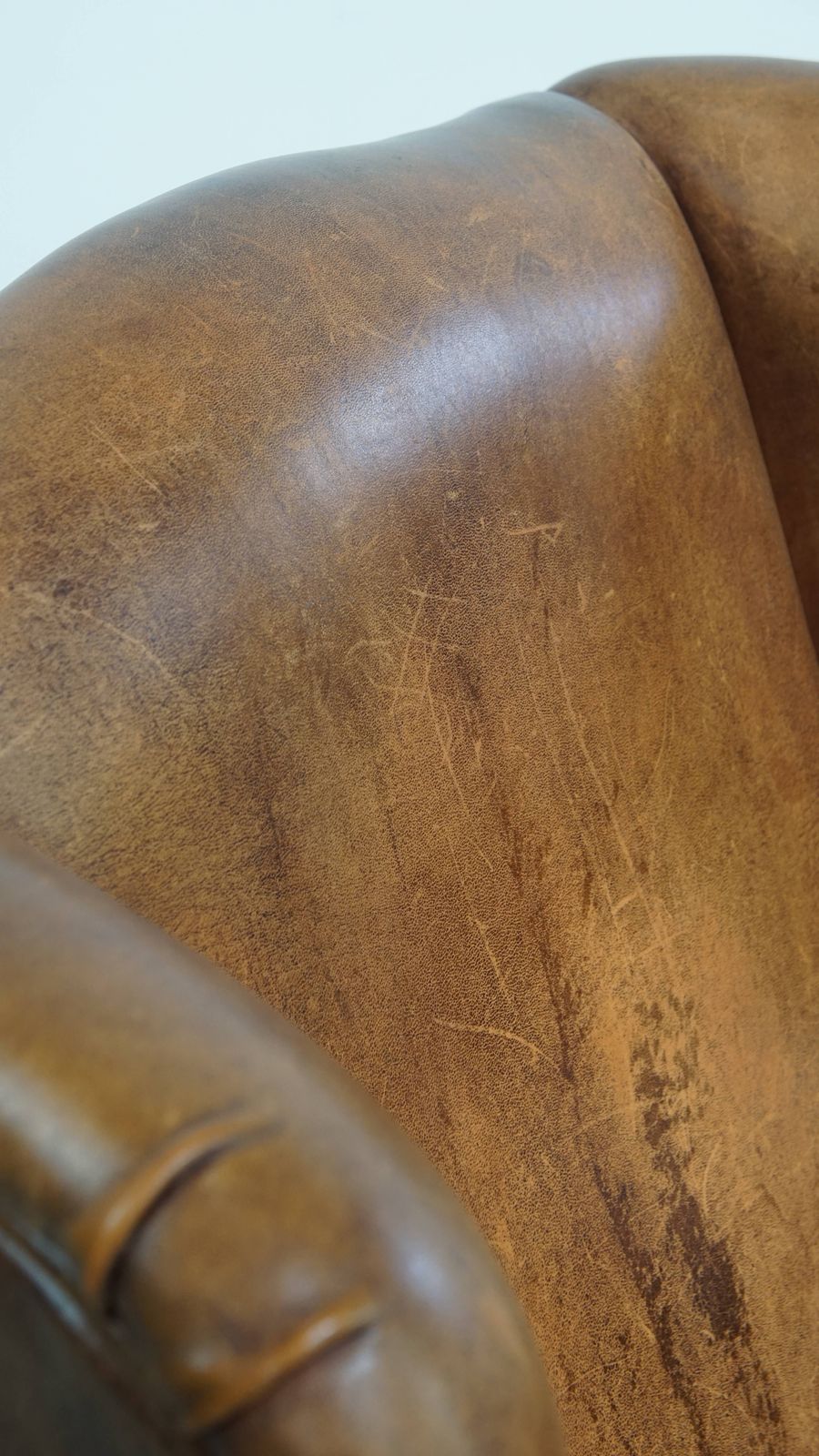 photo vintage Wonderful, Characterful Vintage Sheepskin Wing Chair With A Beautiful Patina
